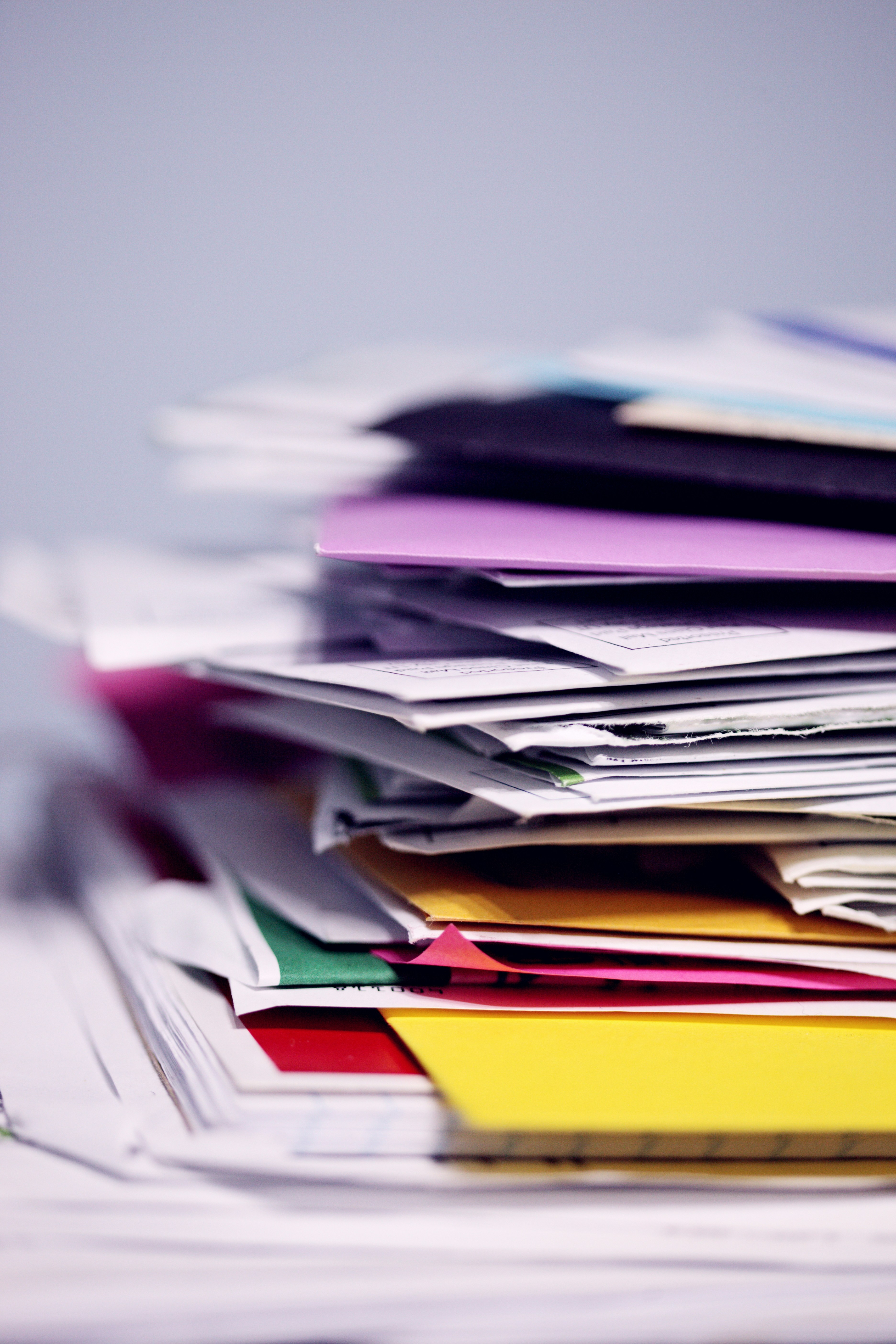 Printed documents and material samples arranged on a table